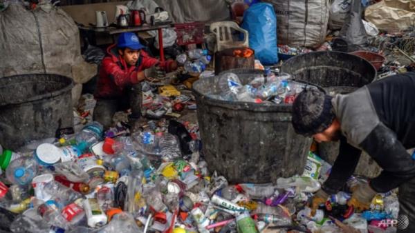 Illegal but essential, migrants recycle Istanbul's waste