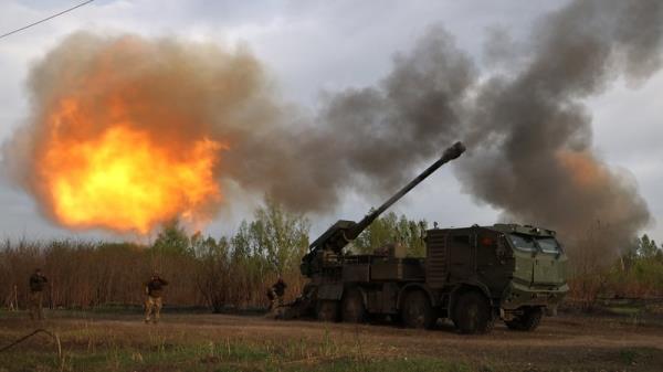 Ukrainian forces fire at Russian position with a self-propelled artillery gun in the eastern Kharkiv region